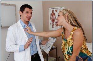 Busty blond wife Carolyn Reese screwed hardcore by the doctor on nudesceleb.com