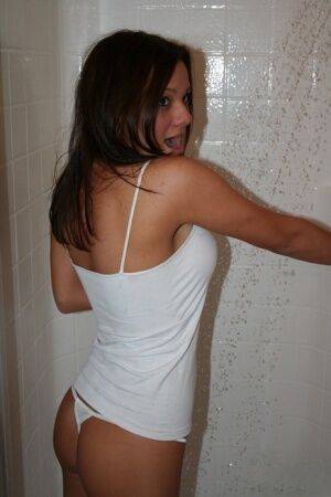 Teen amateur Kate Crush looses her tight ass from a thong in the shower on nudesceleb.com