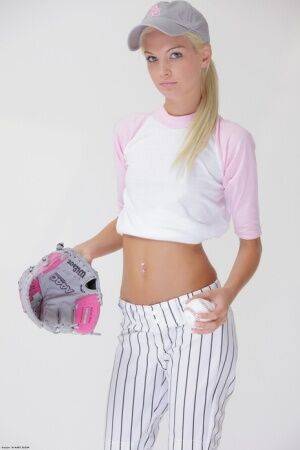 Baseball cutie Francesca loses her uniform to expose her skinny teen body on nudesceleb.com