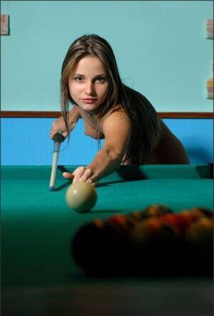 Smoking hot amateur babe loves playing pool butt naked late night on nudesceleb.com