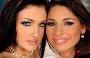 Brunette lesbians Zafira & Aletta Ocean pleasure each other with a sex toy on nudesceleb.com