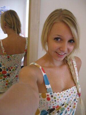 Blonde first timer exposes her tits and twat for self shots in the mirror on nudesceleb.com