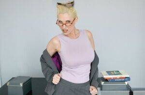 Mature teacher in glasses Devon Lee exposing her smashing goodies on nudesceleb.com