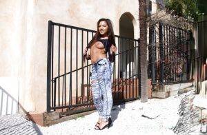 Amateur Asian teen babe Morgan Lee posing in denim jeans outdoors on nudesceleb.com