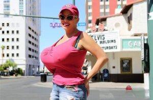 Big titted platinum blonde Claudia Marie seduces a young Latino boy on nudesceleb.com