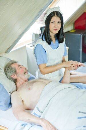 Dark haired nurse relieves her patient of his backed up jizz problem on nudesceleb.com