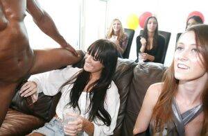 Attractive ladies having fun with a big black meaty pole at the house party on nudesceleb.com