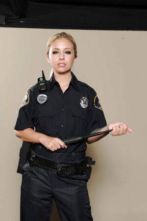 Solo girl Madelyn Monroe releasing boobs from police uniform on nudesceleb.com