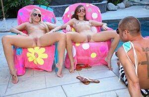 Young girls in bikini and sunglasses do a threesome with their stepbrother on nudesceleb.com