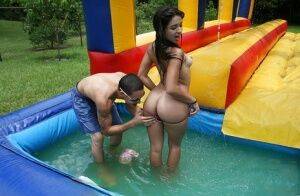 Frisky gals showing off their blowjob skills at the pool party on nudesceleb.com