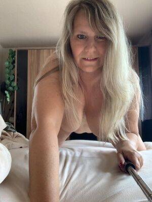 Overweight mature woman Sweet Susi takes nude selfies in her bedroom on nudesceleb.com
