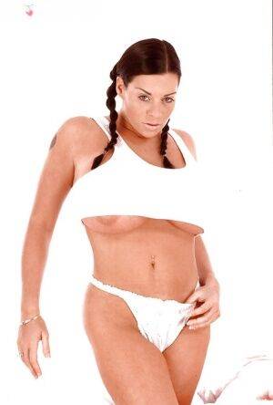 Big tits MILF Linsey Dawn McKenzie demonstrates huge bubbles and trimmed twat on nudesceleb.com