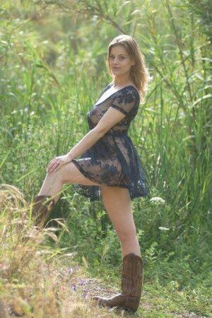Beautiful amateur babe Lottii Rose wearing sexy dress and boots in the nature on nudesceleb.com