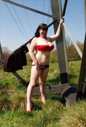 UK amateur Juicey Janey gets naked in heels underneath a hydro tower - Britain on nudesceleb.com