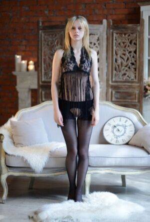 Enticing young Angelika D posing in sheer lingerie for her VIP lover on nudesceleb.com