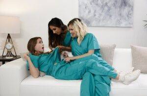 Teen lesbians remove scrubs and socks before an all girl threesome on nudesceleb.com