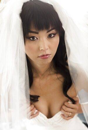Hot Asian pornstar Marica Hase posing topless in wedding dress on nudesceleb.com