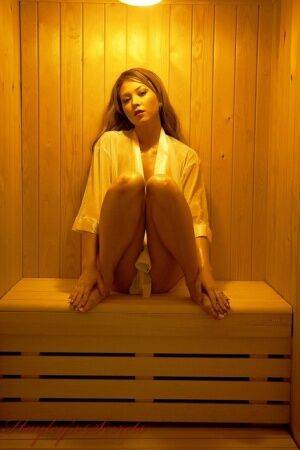 Solo female Natalia Forrest exposes her sweaty body while in a sauna on nudesceleb.com