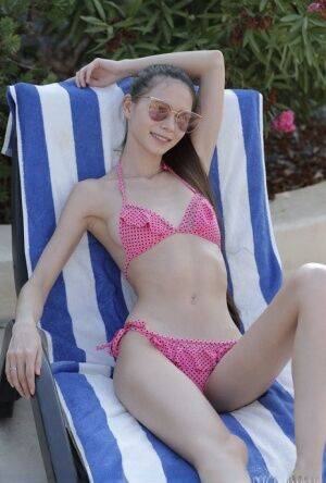 Slender teen Leona Mia removes a bikini and shades for a nude modeling gig on nudesceleb.com