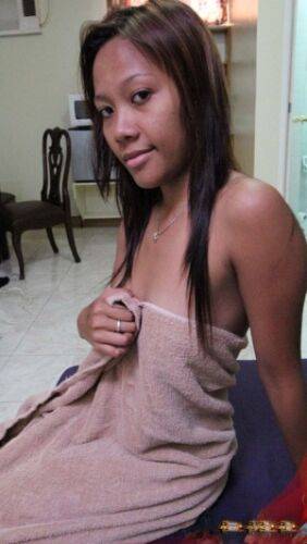 Filipino amateur Leena drips sperm from her ear after sex with a tourist - Philippines on nudesceleb.com