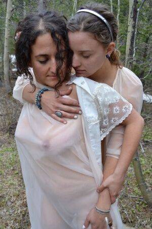 Amateur lesbians Sage and Simona hump a smooth tree in see thru lingerie on nudesceleb.com