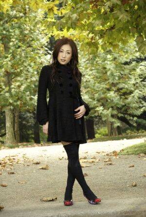 Fully clothed Japanese teen models in the park in black clothes and stockings - Japan on nudesceleb.com