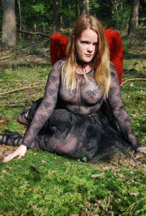 Amateur woman Luscious Models poses in the forest in a cosplay clothing on nudesceleb.com