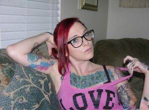 Tattooed redhead Lola takes off her glasses and clothes for her first nudes on nudesceleb.com