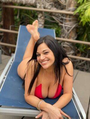 Curvy Latina chick Mona Azar models a bikini before an ass licking blowjob on nudesceleb.com