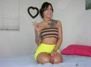 Tattooed brunette Jae Model makes her nude debut by herself on a bed on nudesceleb.com