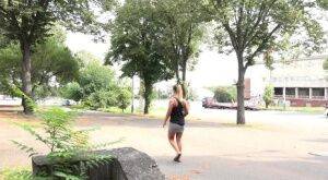 Solo girl Naomi Bennet takes a piss in public while wearing a miniskirt on nudesceleb.com