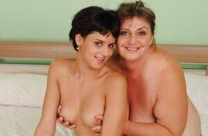 Naughty teen Coco de Mal has some fun with her mature lesbian friend on nudesceleb.com