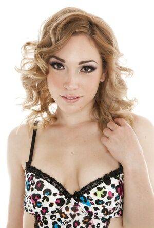 Amazingly lovely teen babe Lily Labeau stripping off her lingerie on nudesceleb.com