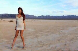 Hot solo model Jayden Cole smokes a cigarette while flashing in the desert on nudesceleb.com