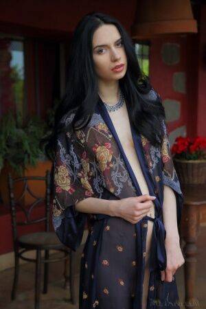 Beautiful teen with dark hair Dita V showcases her perfect pussy in the nude on nudesceleb.com