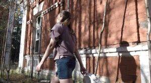 Short taken girl Diana slides a thong aside while pissing behind a building on nudesceleb.com