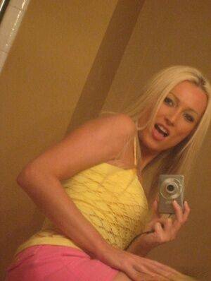 Blonde amateur Diana Doll gets naked for bathroom selfies on nudesceleb.com