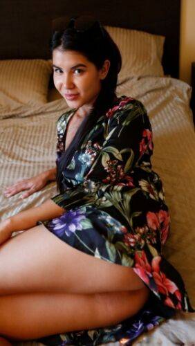 Asian amateur Lady Dee removes her floral print dress before having sex on nudesceleb.com