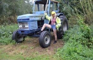 Mature amateur Barby Slut exposes herself on heavy equipment at a job site on nudesceleb.com