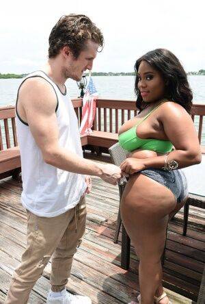 Obese black chick Ms Yummy seduces a white dude with her big booty on nudesceleb.com