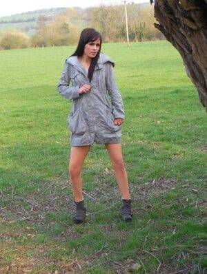 First timer Aglaia Augury gets naked by a tree with her boots on on nudesceleb.com