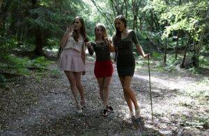 3 young girls walking in the woods find a restrained man and suck his cock on nudesceleb.com