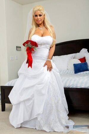 Busty blonde bride Bridgette B bangs another man on her wedding day on nudesceleb.com