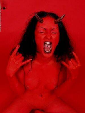 Red demon slut fucks self with devil dildo on nudesceleb.com