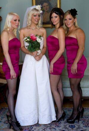 Blonde bride is forced to submit to dominant lesbians in a dungeon on nudesceleb.com