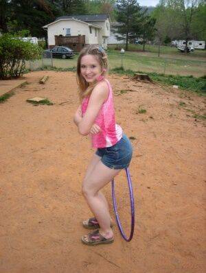 Petite teen Shelby plays around with a hoola hoop on nudesceleb.com