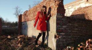 Caucasian girl Nastya takes a piss behind the remnants of a brick house on nudesceleb.com