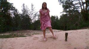 Distressed girl Nastya squats for an urgent piss on a sandbank on nudesceleb.com