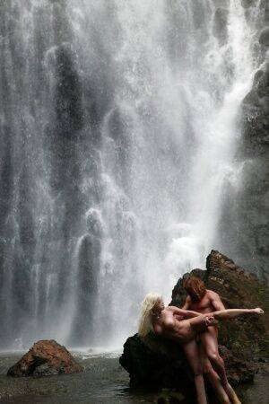 Stunning milf Jesse Jane fucks outdoor in the waterfall on cam on nudesceleb.com