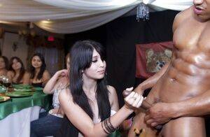 Interracial party with a hot muscular stripper and wild chicks on nudesceleb.com